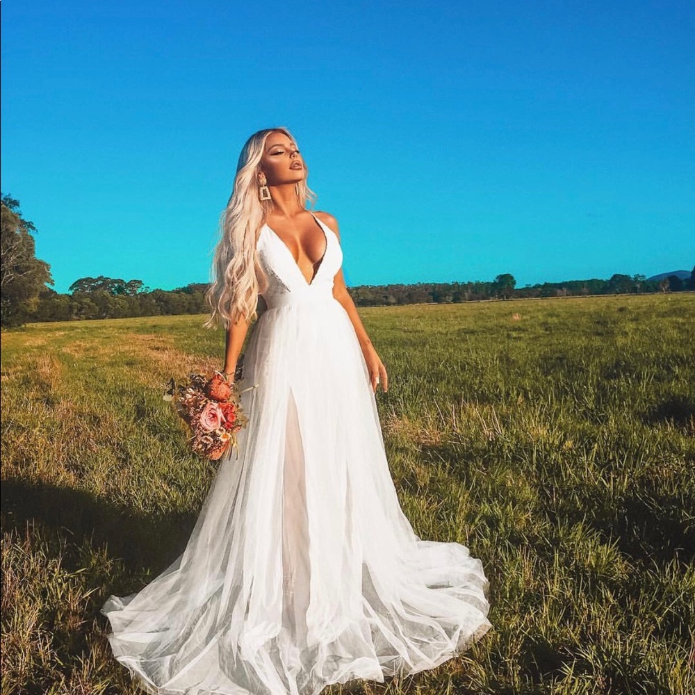 Fashion Nova on the runway white maxi dress